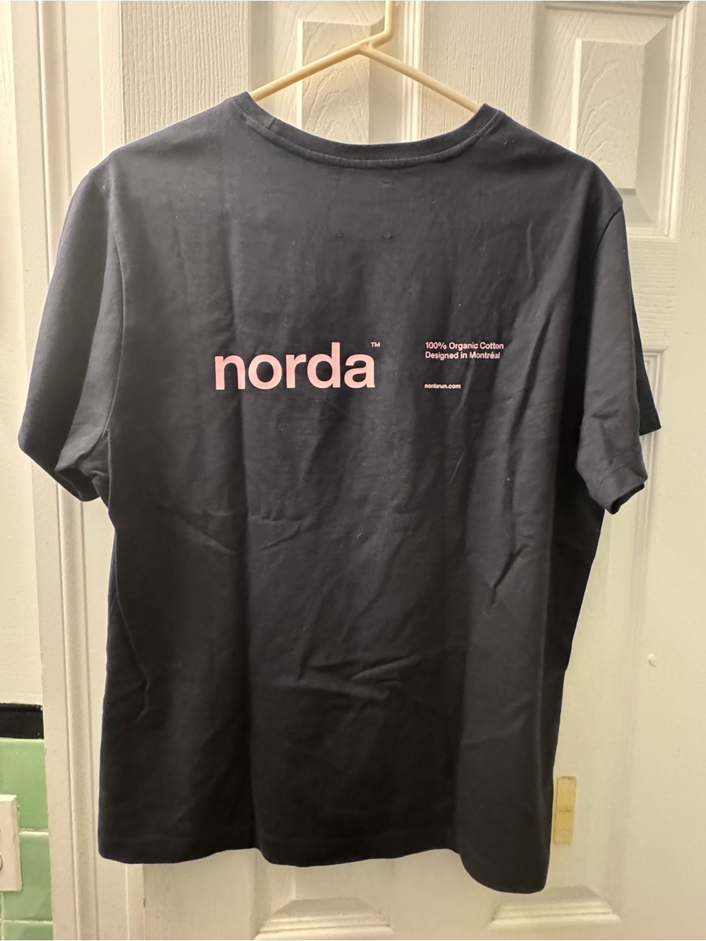 NORDA  Black Short Sleeve Tee with Pink NORDA Logo